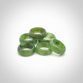 This is a hand carved jade ring. These are lovely British Columbian jade rings which are nice, solid little works of art. We ship these worldwide for free and are happy to answer any questions that you may have about these or other products on our website.